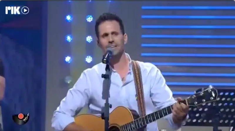 RIK TV performance acoustic guitar singer Cyprus